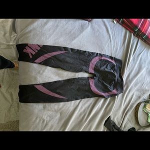 Pink. Leggings. Black with pink trim. Large. Never worn